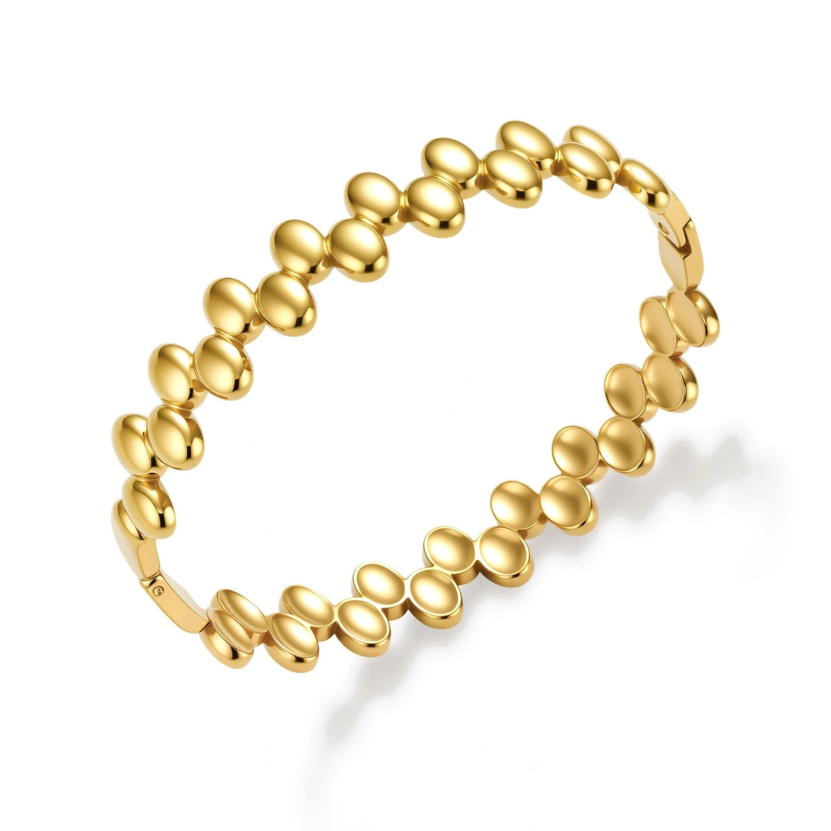18K gold plated stainless steel bangle with dual rows of polished oval pebble beads on a cream background.