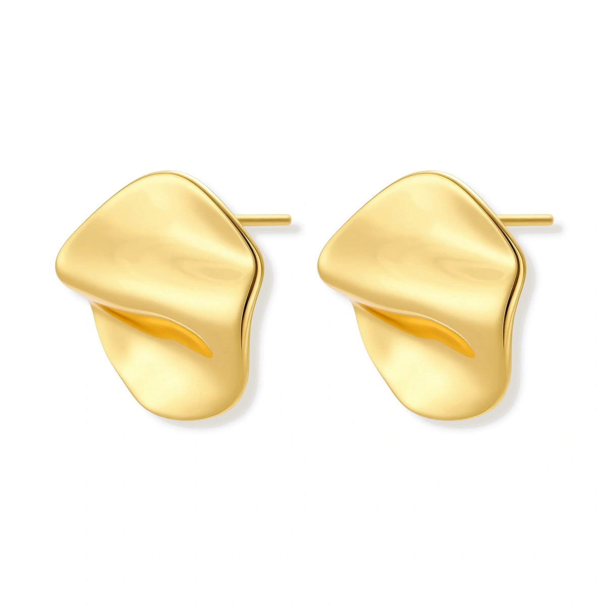 Close-up of organic gold-plated sterling silver stud earrings with flowing sculptural design and curved cut-outs