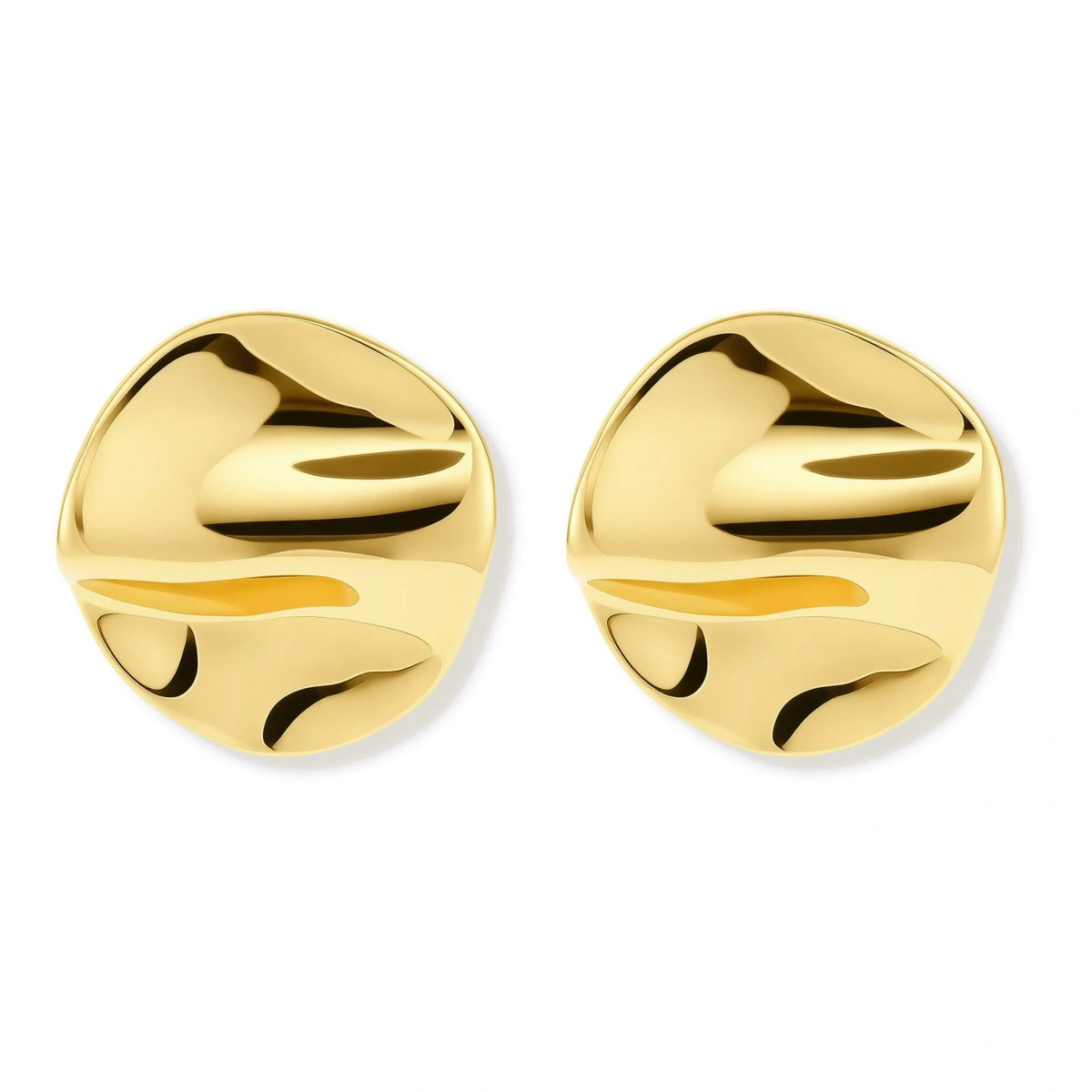 Close-up of organic gold-plated sterling silver stud earrings with flowing sculptural design and curved cut-outs