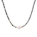 Dainty necklace with faceted purple iolite beads, gold vermeil accents, and central pink-white freshwater pearl.