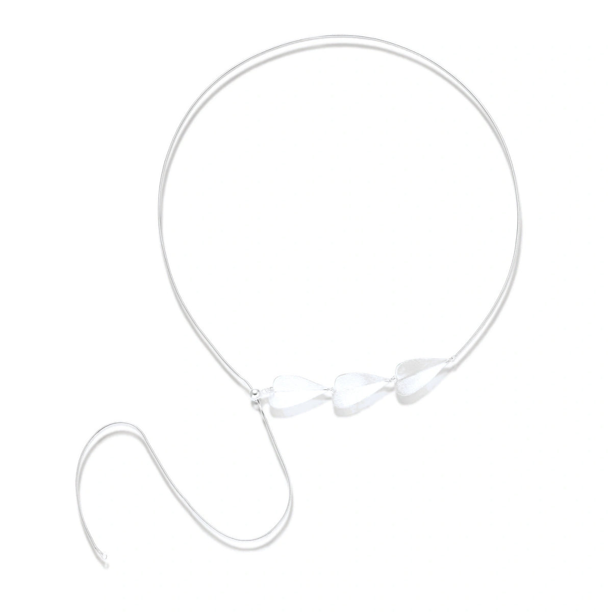 Minimalist sterling silver necklace with three brushed leaf-shaped pendants on delicate chain against white background