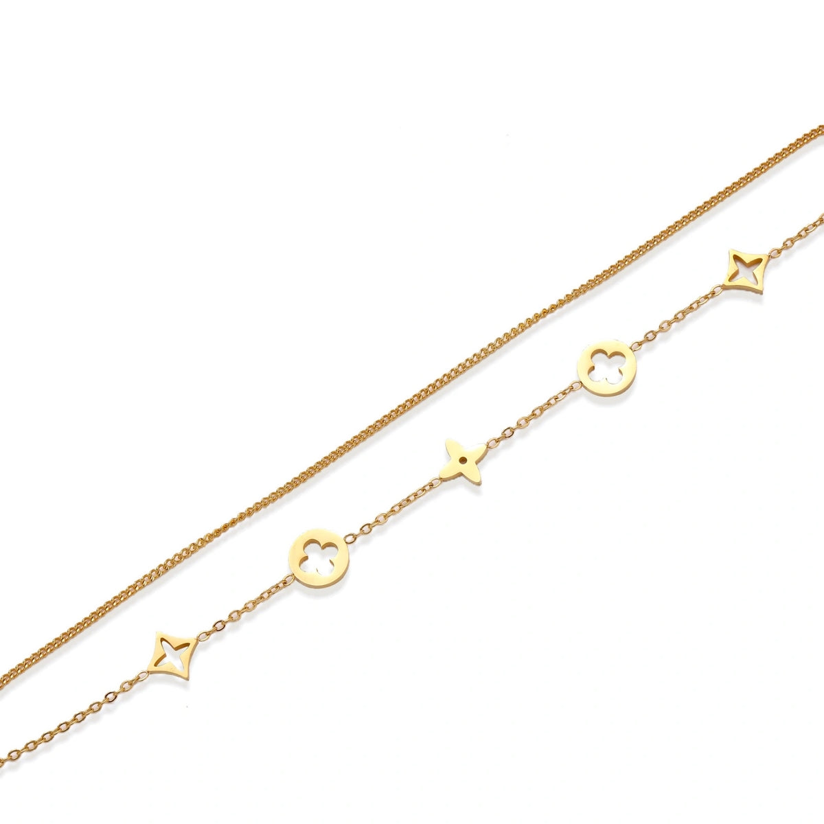 Double-layer gold-plated bracelet with quatrefoil and star charms on cream background, 18K gold finish.