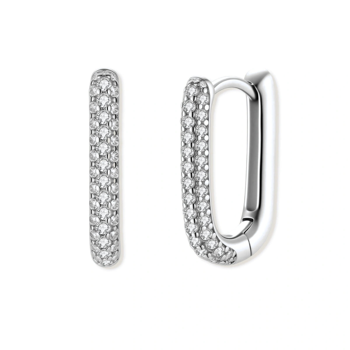 Close-up of platinum-plated sterling silver huggie hoops with pavé crystal setting on white background.